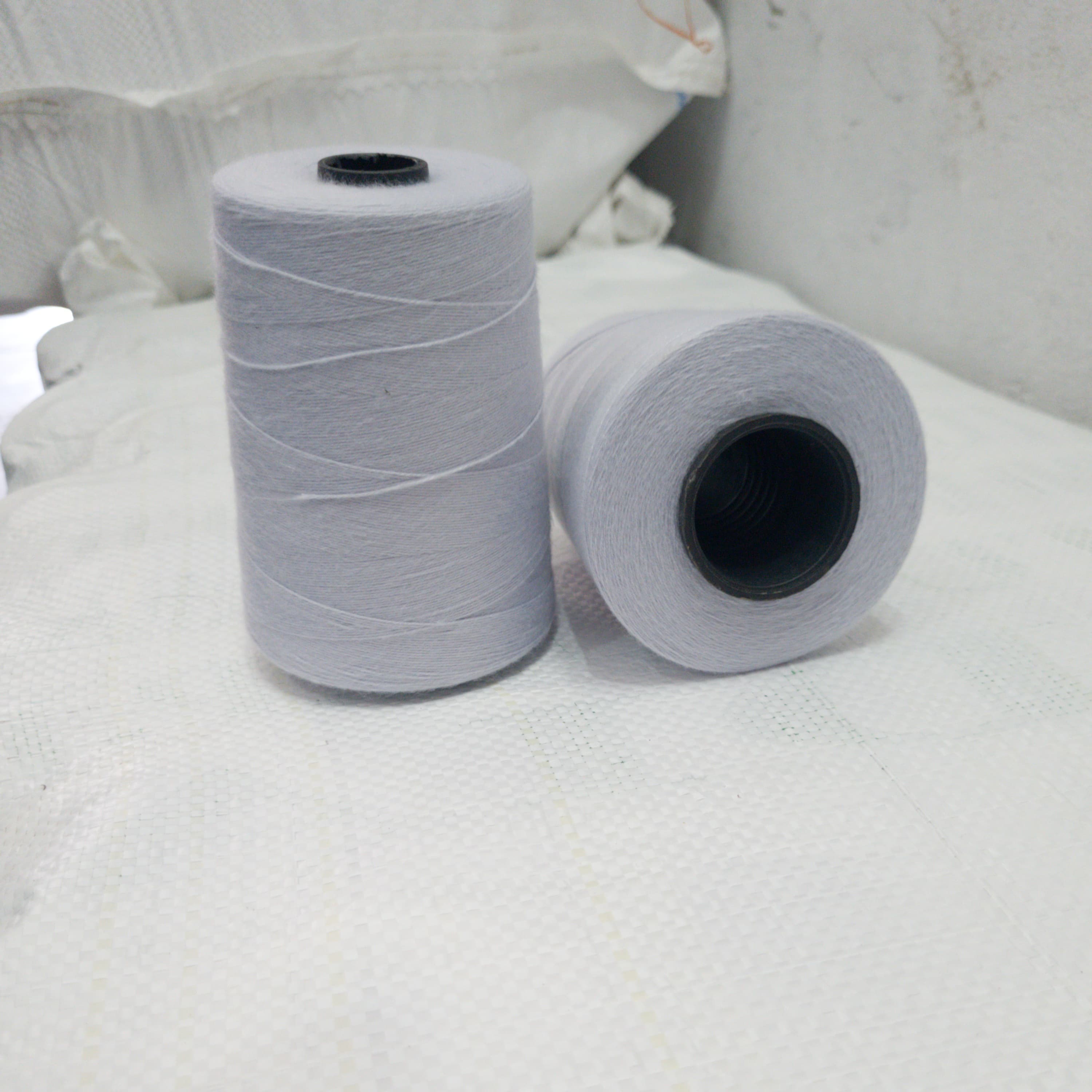 Blue 3-ply recycled polyester yarn spools, 12 count